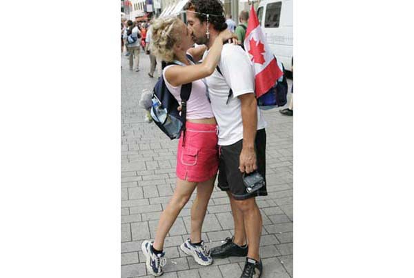 A couple kissing at World Youth Day 2005